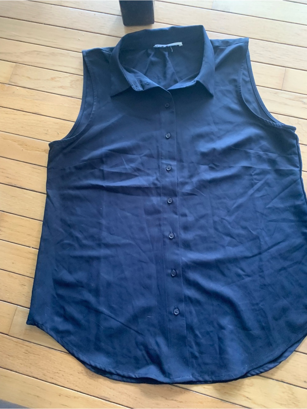Cleo large and XL Navy sleeveless blouses
Excellent condition